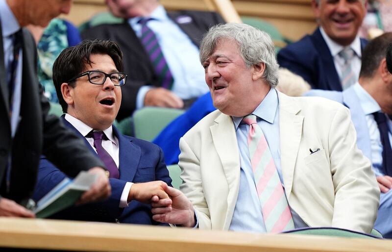 Michael McIntyre and Stephen Fry in the royal box on day nine of the 2024 Wimbledon Championships