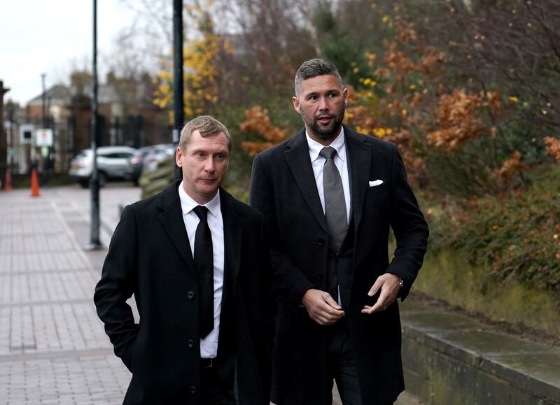 Former Everton player Tony Hibbert (left) and former boxer Tony Bellew (right) arrive at the service