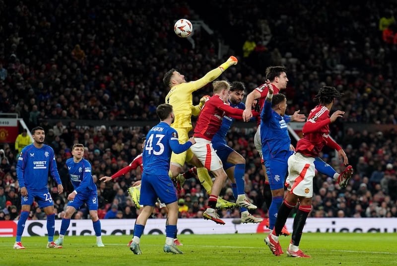 Rangers goalkeeper Jack Butland punches the ball into his own net