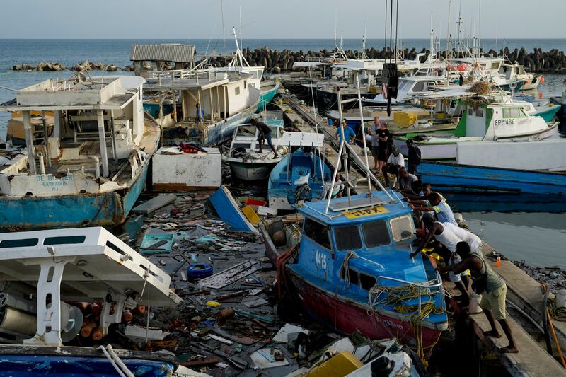 Fishing boats were jostled by the storm (AP)
