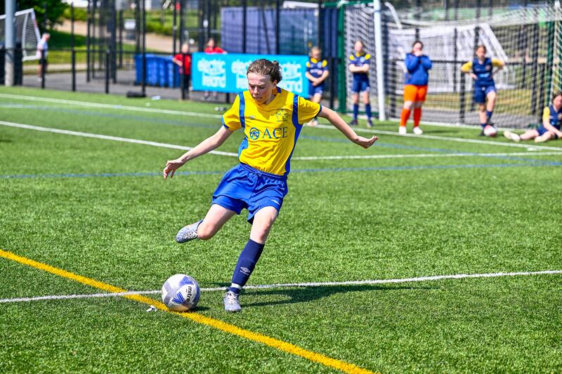 Girl playing football