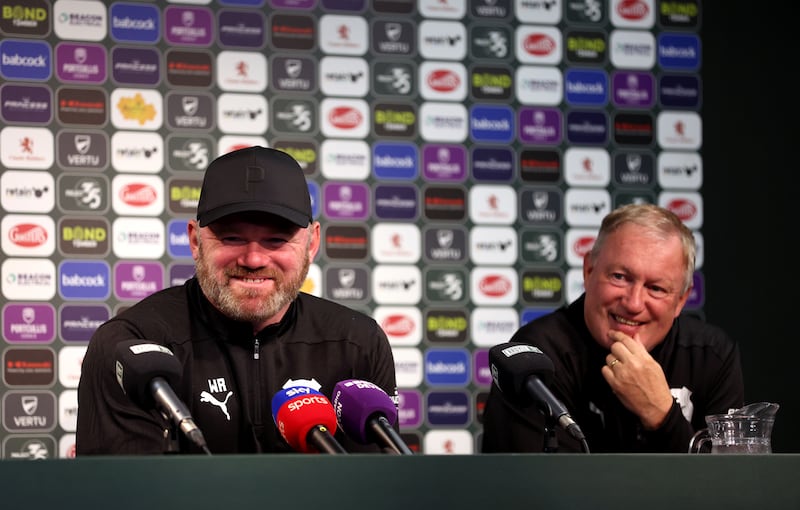 Rooney (left) was in good spirits as he held his first press conference as Plymouth boss