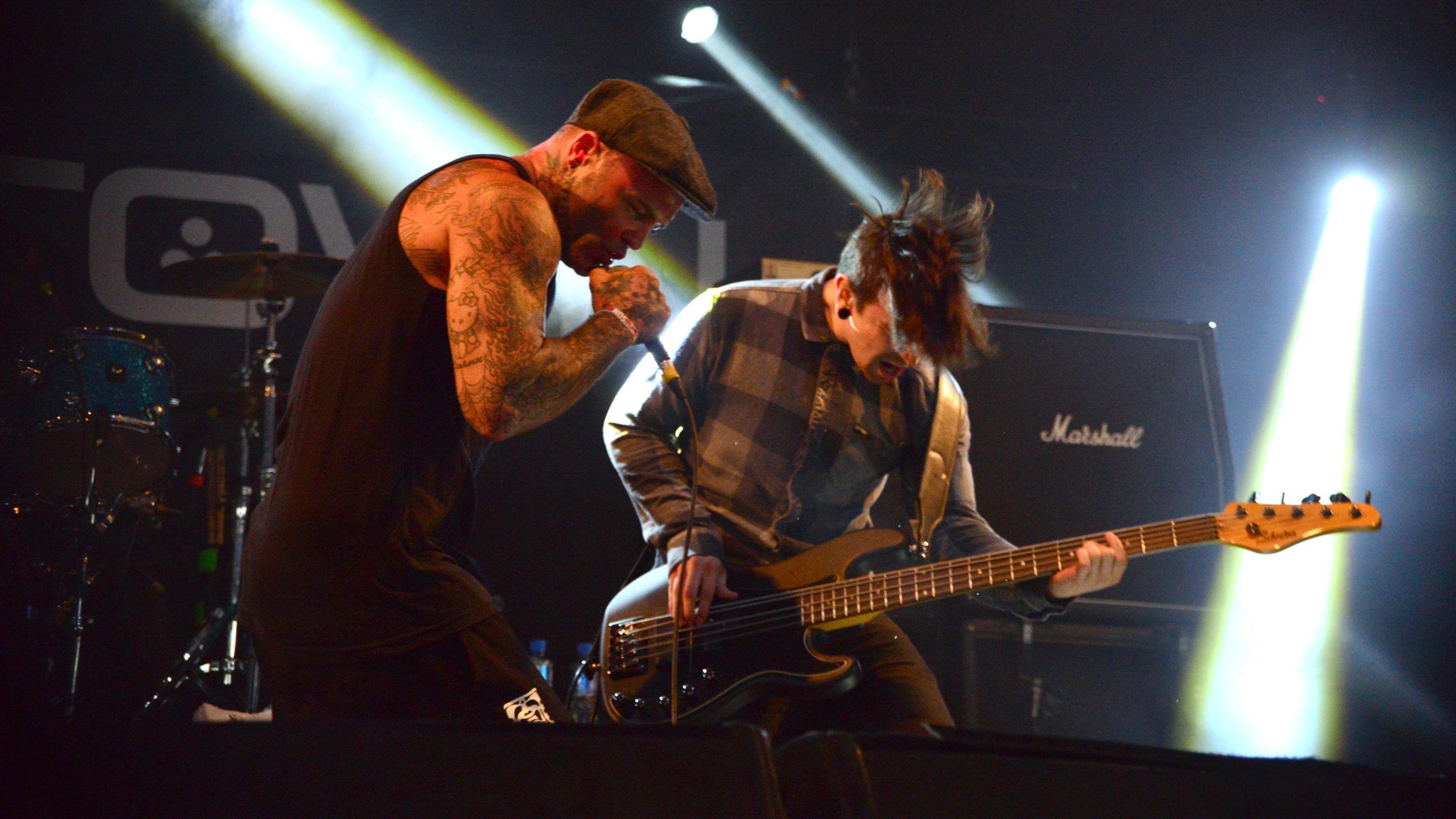 Seth Binzer (left) playing at the Download Festival with Crazy Town in 2014