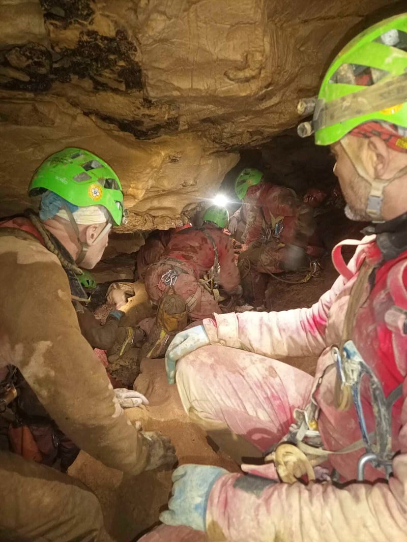 Rescue workers attempt to free Ottavia Piana, a caver blocked in a deep inside the Bueno Fonteno cave, near Bergamo, Italy (Soccorso Alpino/AP)