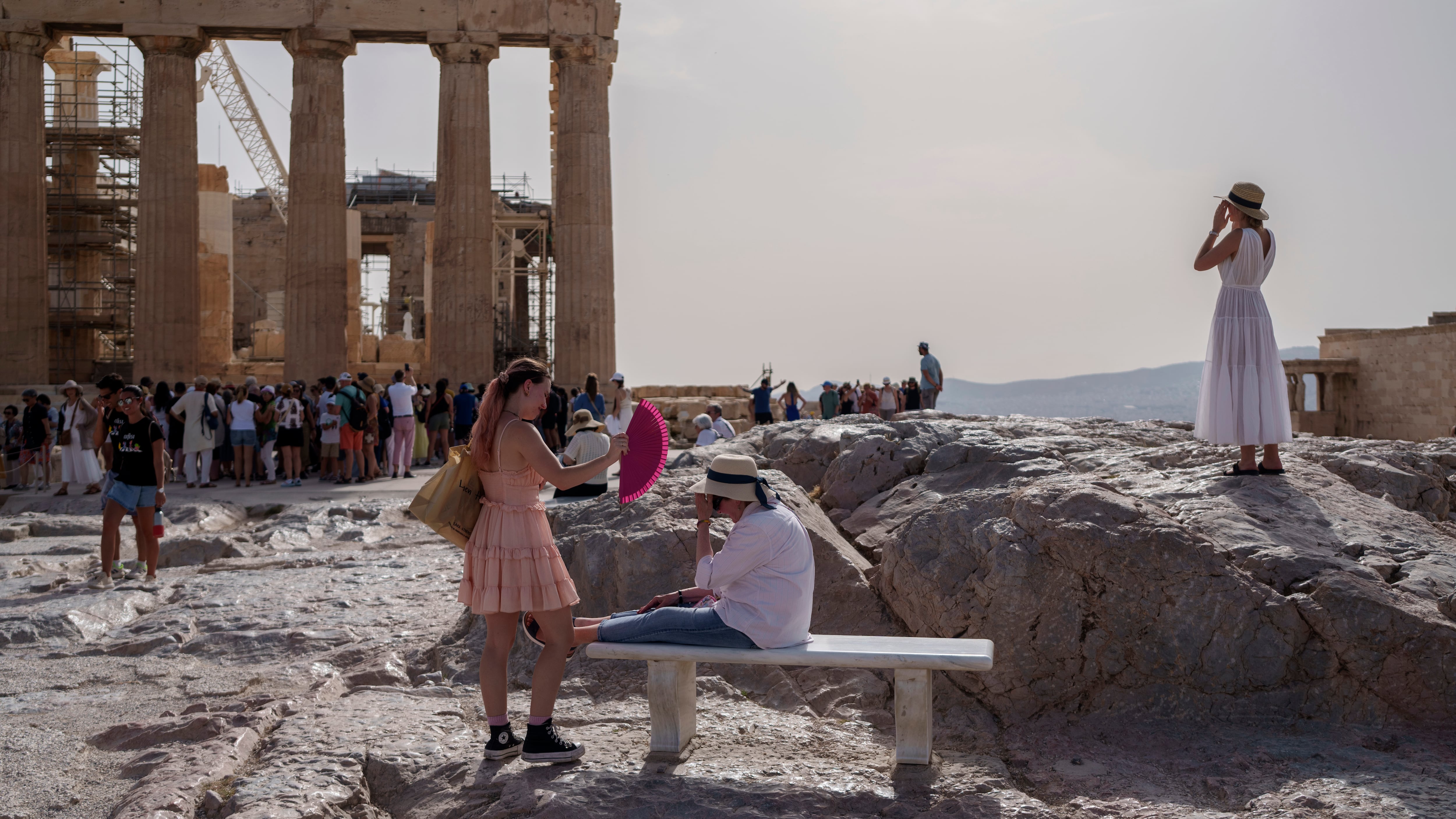 Greek authorities are closing the Acropolis in Athens for a second afternoon on Thursday as the country swelters in unseasonably high temperatures (Petros Giannakouris/AP)