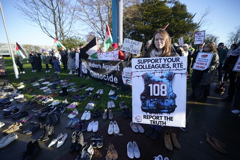 108 pairs of shoes for each journalist killed in Gaza are laid out as Mother’s Against Genocide protest outside RTE in Dublin