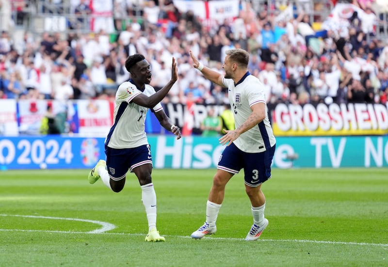 England’s Bukayo Saka (left) celebrated with Shaw after scoring against Switzerland last weekend