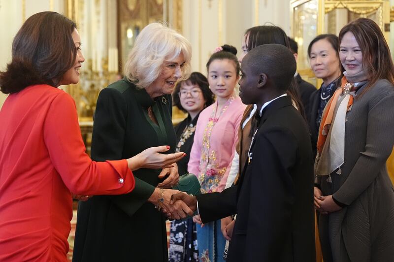 Camilla meeting the winners and runners-up during the reception at Buckingham Palace