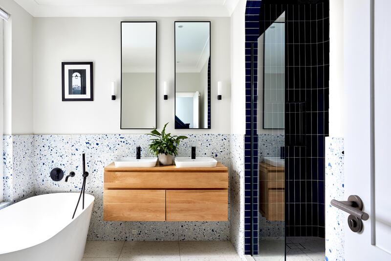 A wall-hung vanity with built-in organisers maximises space in this contemporary bathroom by BetterPAD