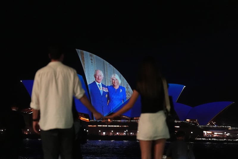 A picture of Charles and Camilla projected onto Sydney Opera House