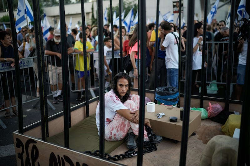 Protests against the war have taken place in Israel (AP Photo/Leo Correa)