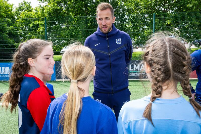 England captain Harry Kane speaks to schoolchildren (Paul Cooper/Daily Telegraph)