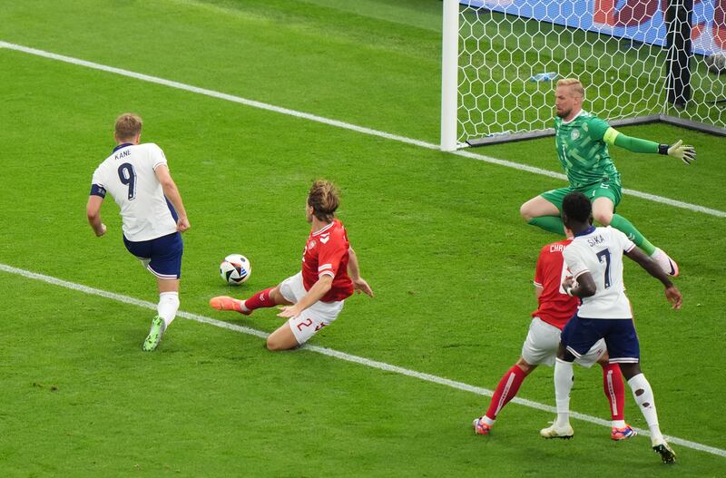 England’s Harry Kane scores against Denmark at Euro 2024.