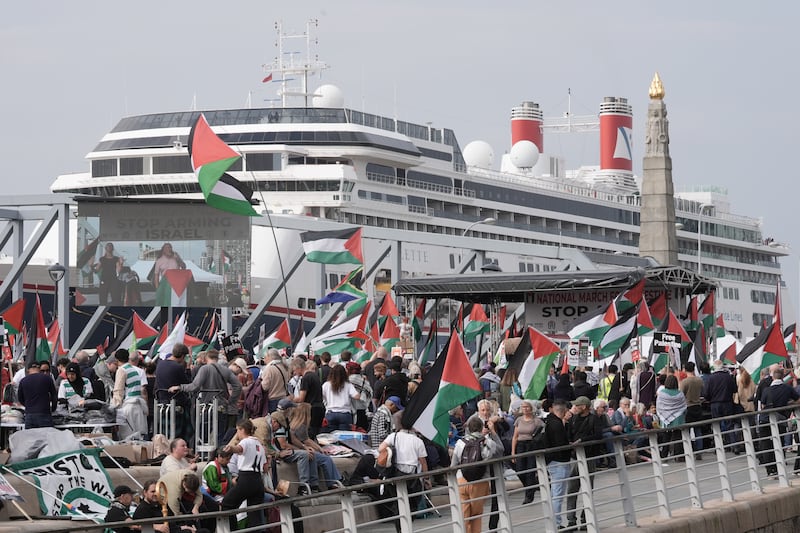 People take part in a march for Palestine in Liverpool to coincide with the Labour Party conference