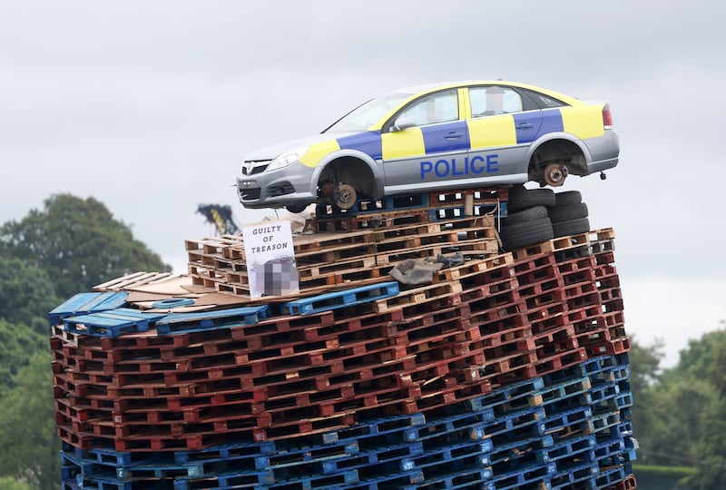 Press Eye - Belfast - Northern Ireland - 10th July 2024
. 
A mocked up police car on top of the bonfire in Moygashel, outside Dungannon, Co. Tyrone.  The bonfire is due to be lit tonight(10th July).

Bonfires are lit across Northern Ireland every 11th July to commemorated the battle of the Boyne in 1690. 

Photo by Jonathan Porter/Press Eye