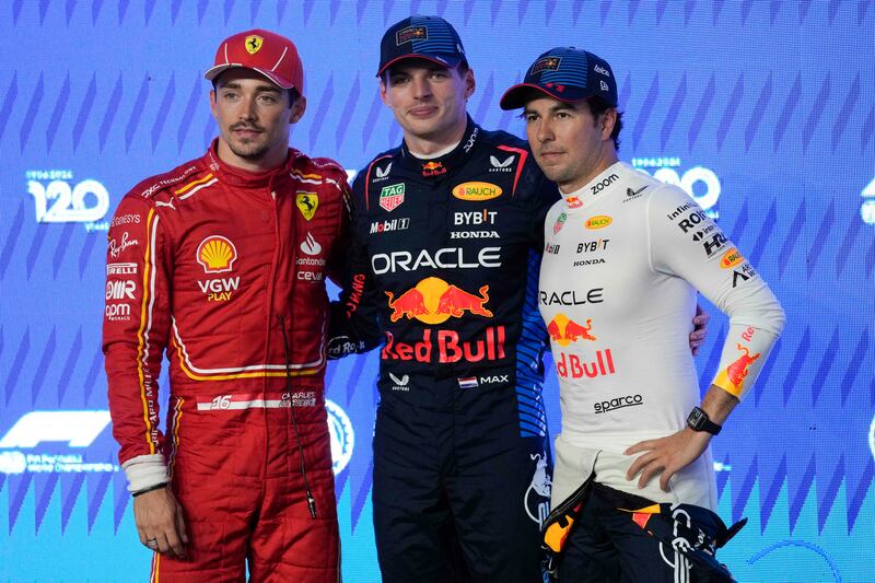 Max Verstappen, centre, was quickest in qualifying (Darko Bandic/AP)