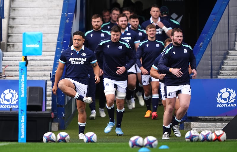 Sione Tuipulotu, left, leads Scotland’s team run at Murrayfield