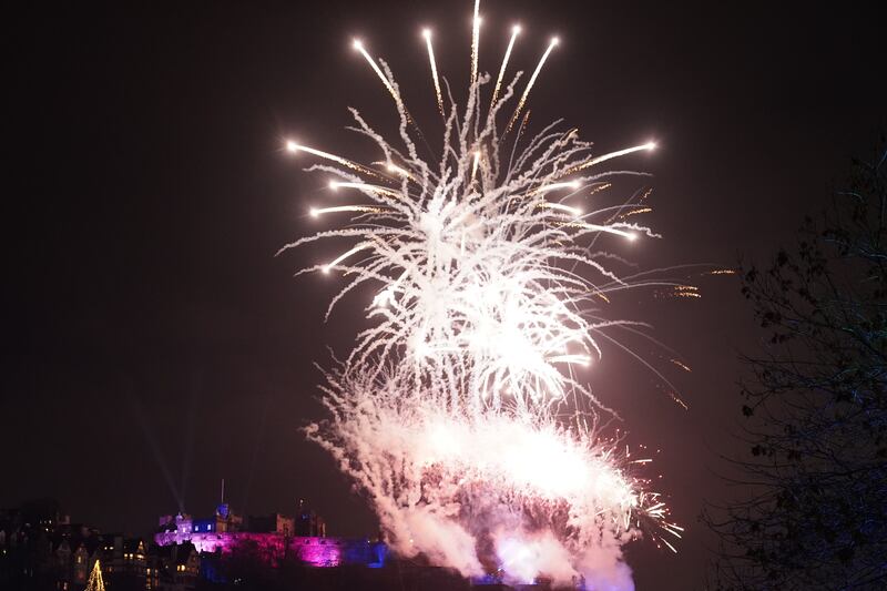 Fireworks explode over Edinburgh Castle during the street party for Hogmanay New Year celebrations in Edinburgh. Picture date: Sunday December 31, 2023.