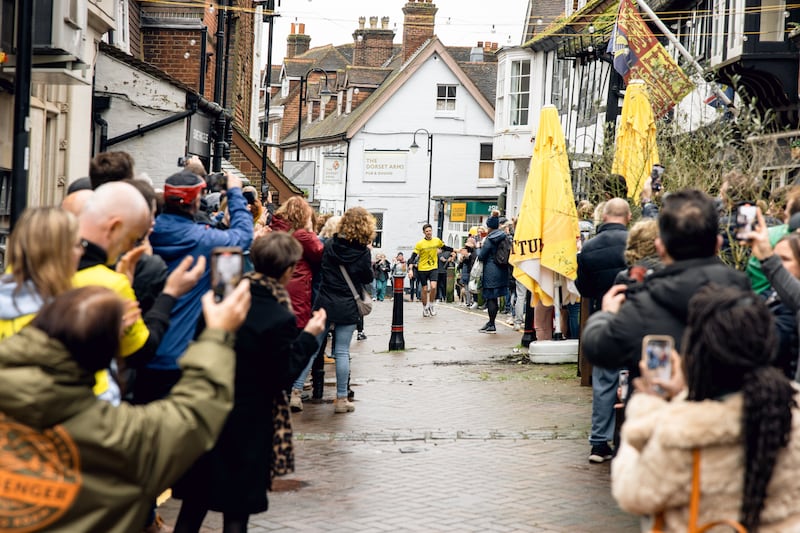 James Cooper approaches the finish line of his final marathon of the year – 366 in total – on Middle Row, East Grinstead Image: Cameron Pettitt and Harry Manser