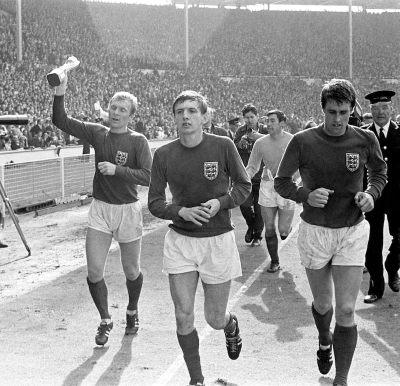 Martin Peters, centre, played alongside Bobby Moore, left, and Geoff Hurst, right, for West Ham