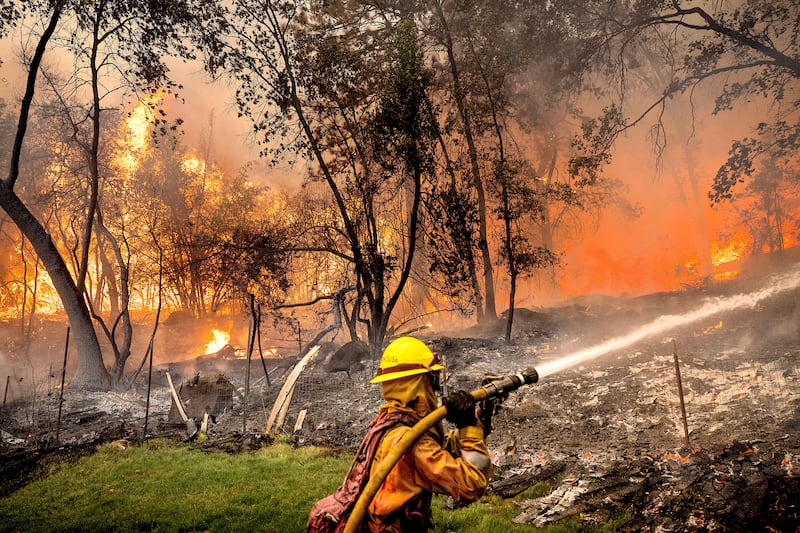 Firefighters battle the Park Fire in Butte County (Noah Berger/AP)