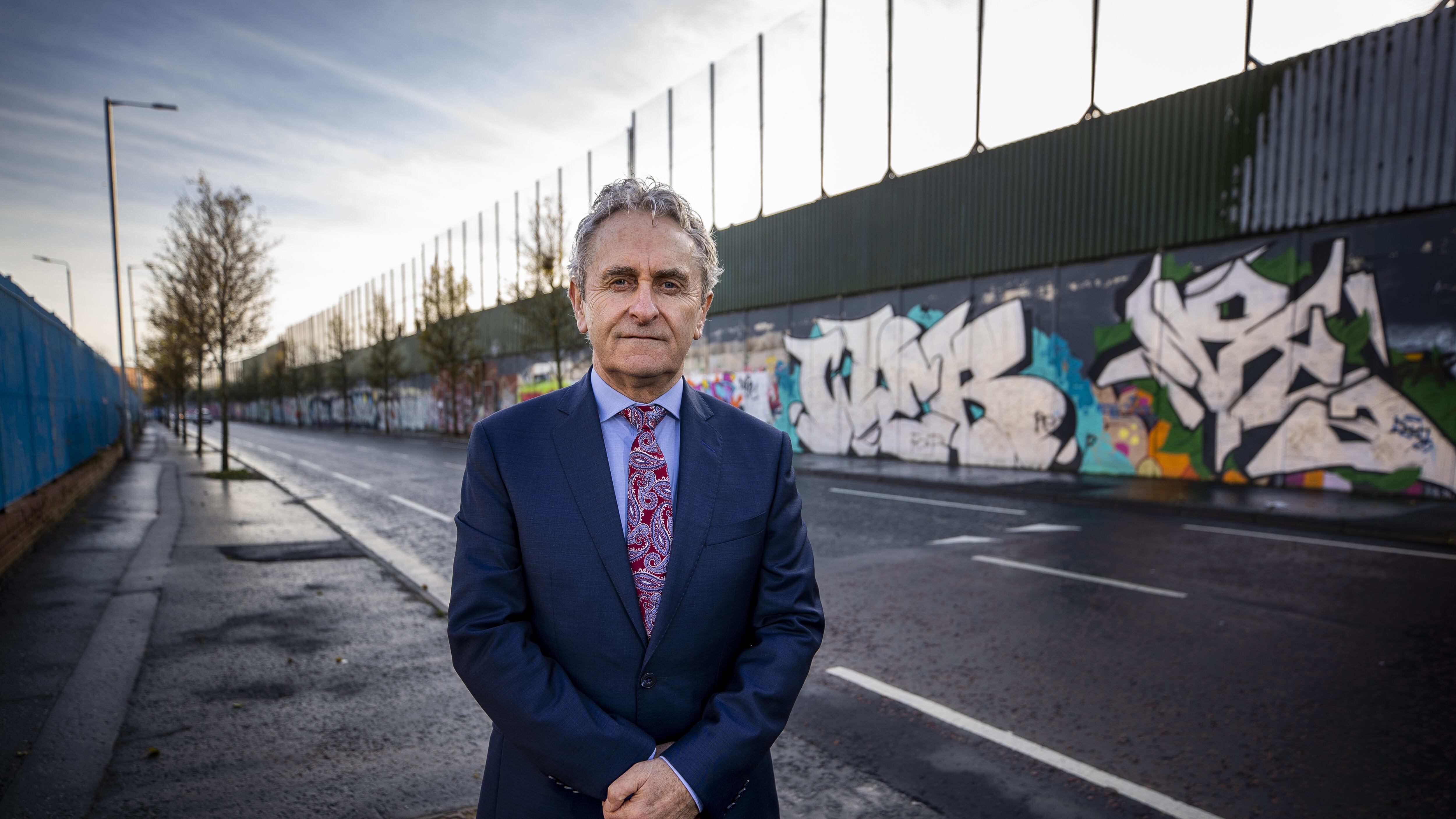 Paddy Harte, chairman of the Board of the International Fund for Ireland at Belfast’s Peace Walls