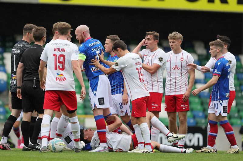 Linfield and Larne players confront each other after a clash of heads during Saturday's Sports Direct Premiership clash at Windsor Park