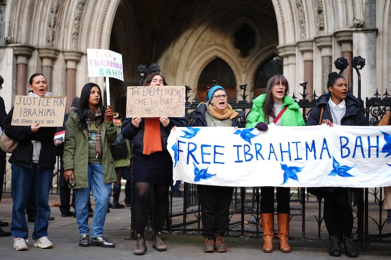 A protest was staged outside the Royal Courts of Justice in London