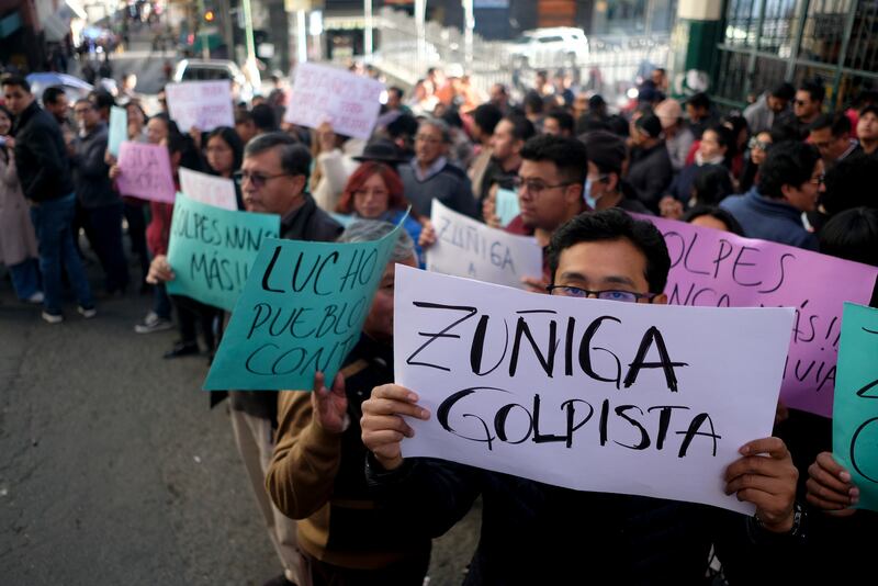 Supporters of the president demonstrate outside the prosecutor’s office demanding jail time for Juan Jose Zunig (Carlos Sanchez/AP)