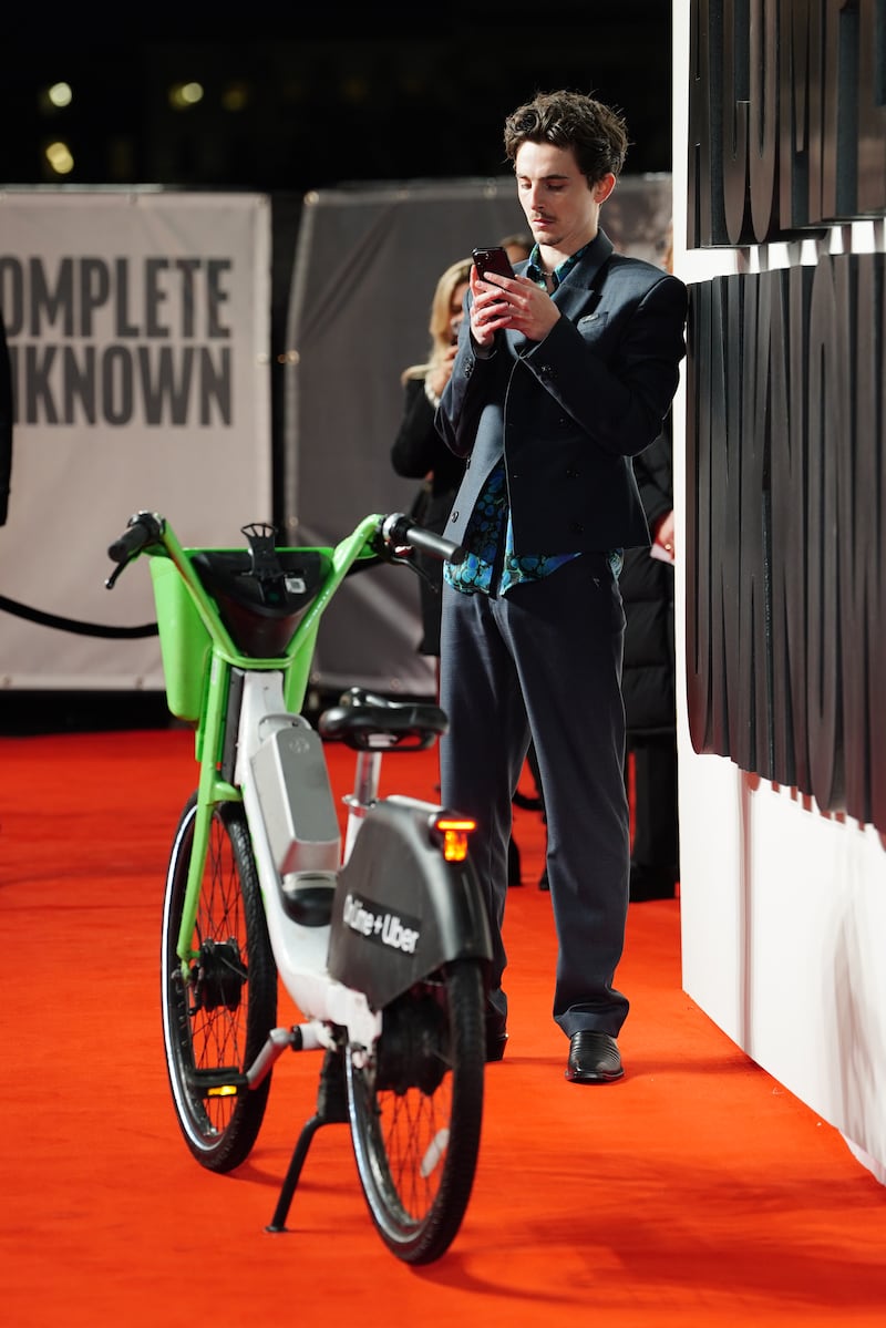 Timothee Chalamet with the Lime bike he arrived on