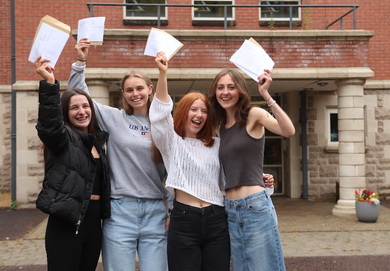 From L-R Isabella de Meulemeester, Dervla Crilly Mc Aufield, Olivia Napier and Blaithin Drain from St Dominic’s in West Belfast receive their A level results. PICTURE COLM LENAGHAN