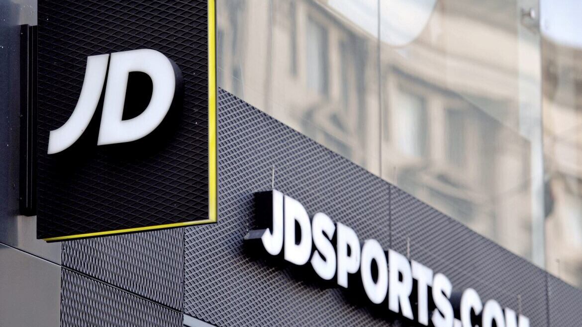JD Sports has reported record-high profits and revenues as the sportswear retailer steamed ahead with global expansion 