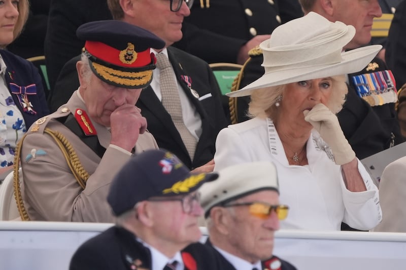 The King and Queen appear emotional during the UK national commemorative event for the 80th anniversary of D-Day in Ver-sur-Mer, Normandy, France