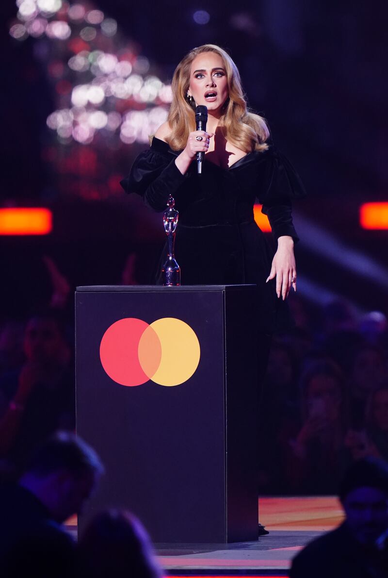 Adele receives the award for Artist of the Year during the Brit Awards 2022