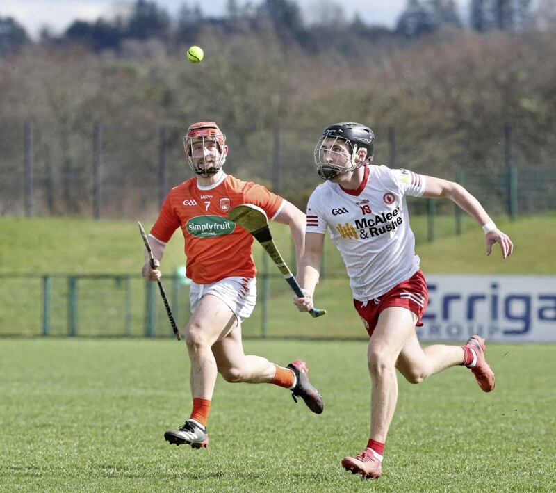 Tyrone Ruairi Slane with Kieran McKernan of Armagh during the National Hurling League Division 3A Final match at Owenbeg on Saturday 2nd April 2022. Picture Margaret McLaughlin. 