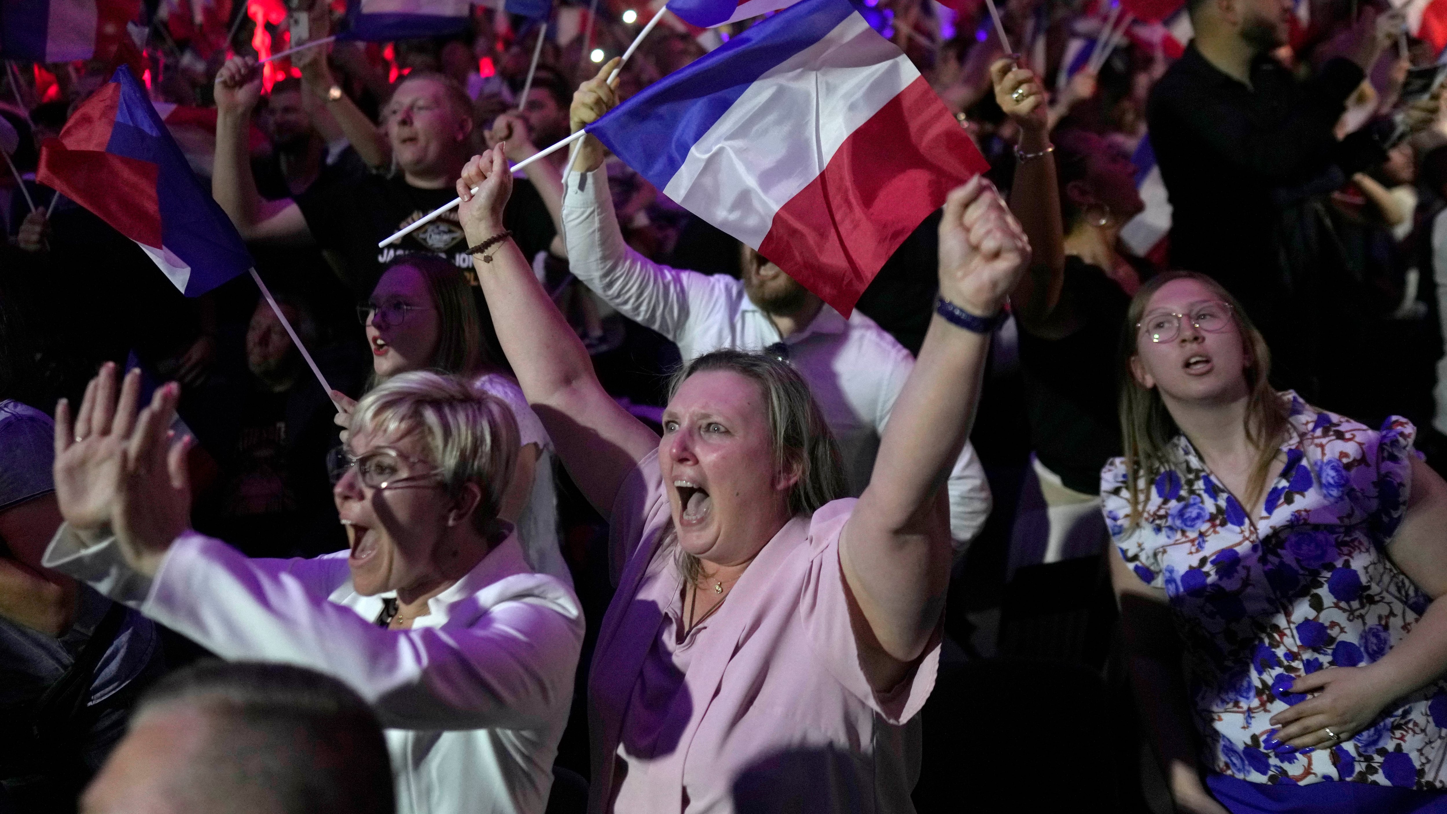 Supporters of French far right leader Marine Le Pen cheer (Thibault Camus/AP)