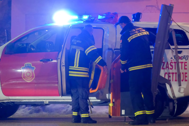 Rescue workers at the site of the shooting in Cetinje, Montenegro (AP Photo/Risto Bozovic)