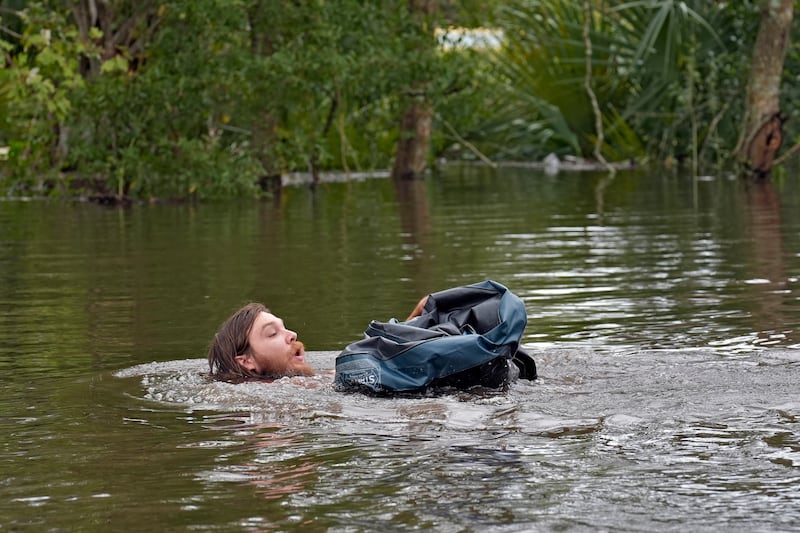 Florida residents returned to the region to assess the damage, with severe flooding still in many areas (Chris O’Meara/AP)