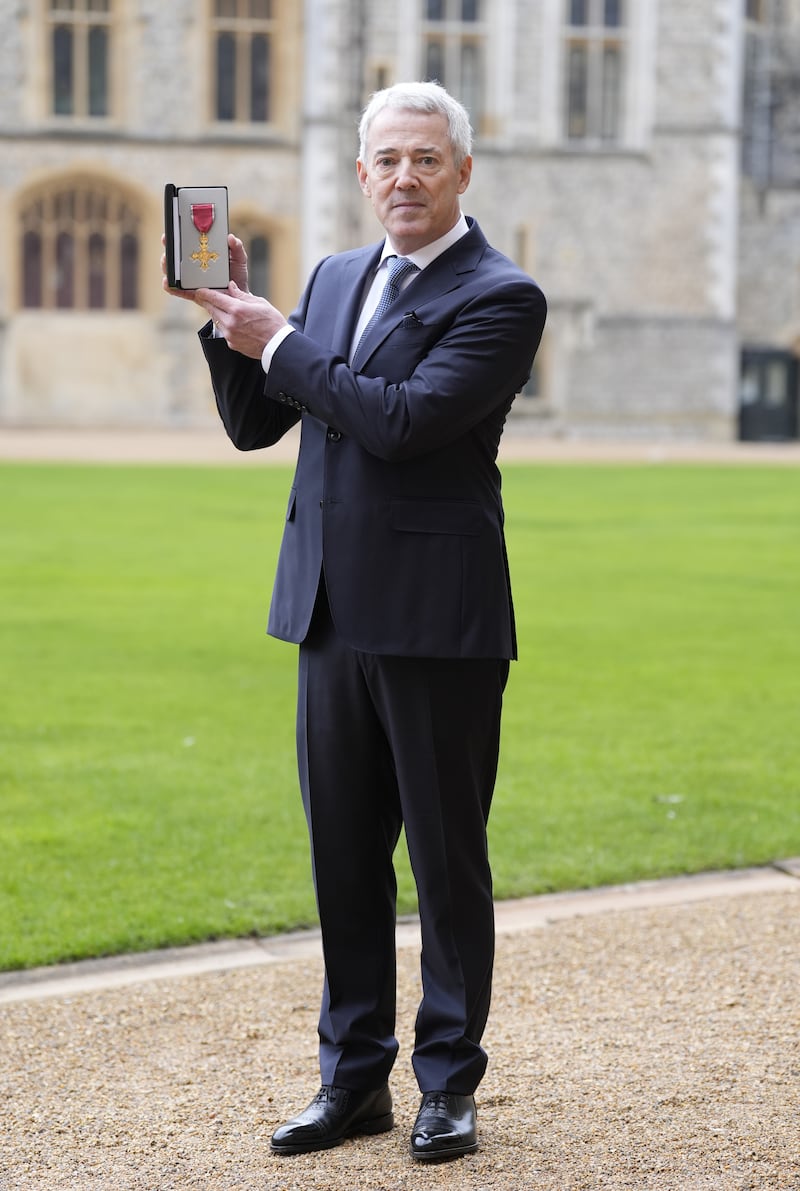 David Mearns, a marine scientist and oceanographer, after being made an Officer of the Order of the British Empire (OBE) by the Prince of Wales at an Investiture ceremony at Windsor Castle, Berkshire