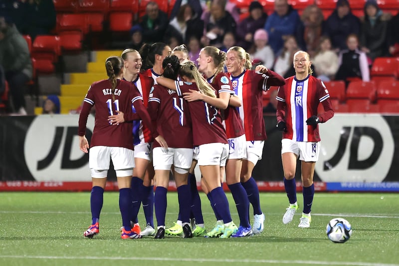 Norway’s Tuva Hansen, centre, celebrates with her team-mates after scoring her side’s second goal against Northern Ireland