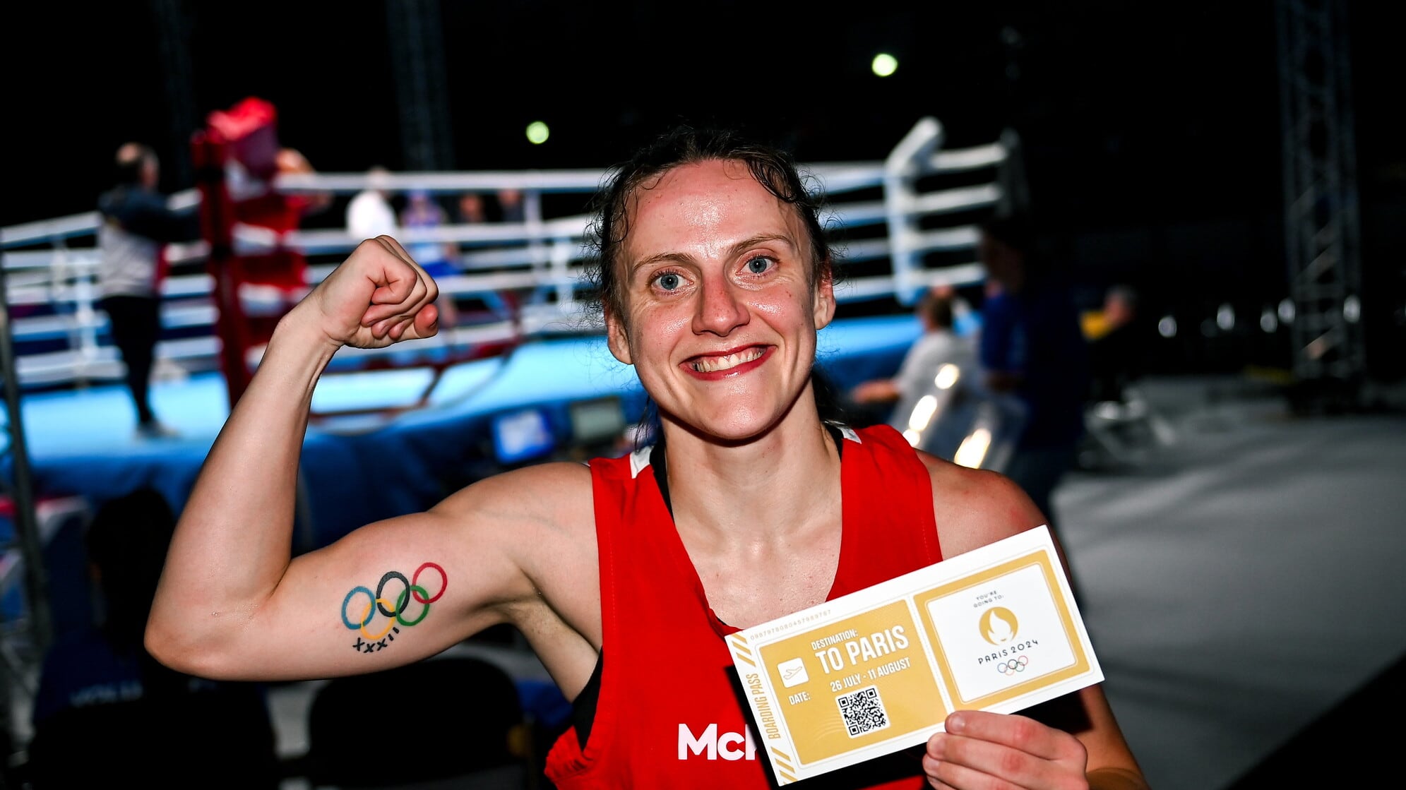 Belfast feather Michaela Walsh shows off her 'ticket to Paris' after victory in yesterday's quarter-final at the European Games in Poland 