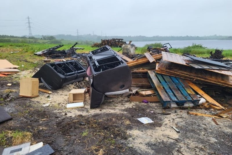 The site, owned by Northern Ireland Water, has seen the appearance of ‘UVF’ graffiti in recent weeks as well as junk piling up, which locals say is “spilling out on to the road”