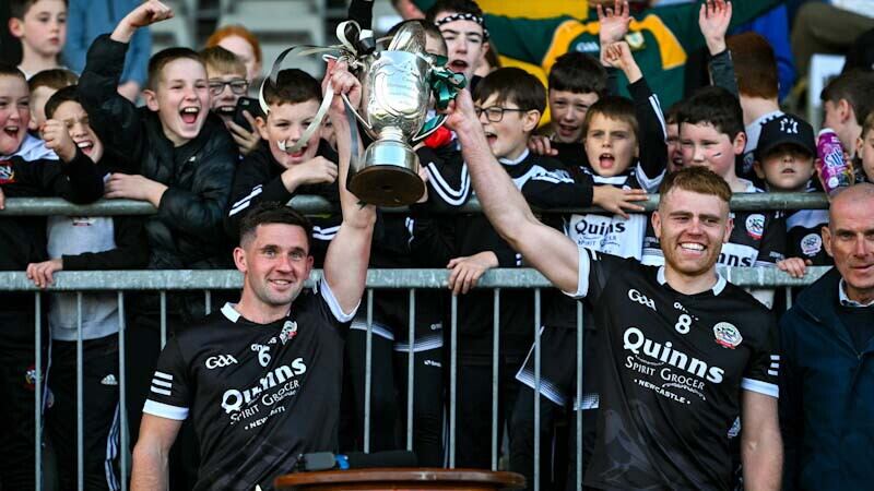 The Kilcoo players celebrate Sunday's Down SFC final victory over Burren.