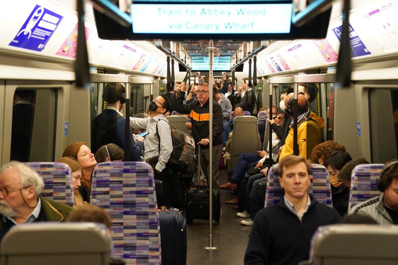 Passengers on board an Elizabeth Line train