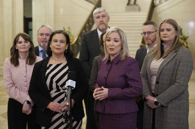 Sinn Fein President Mary Lou McDonald (front left) and First Minister Michelle O’Neill (front right) with Caoimhe Archibald (left), John O’Dowd (centre back) and Philip McGuigan (second right) at Parliament Buildings at Stormont