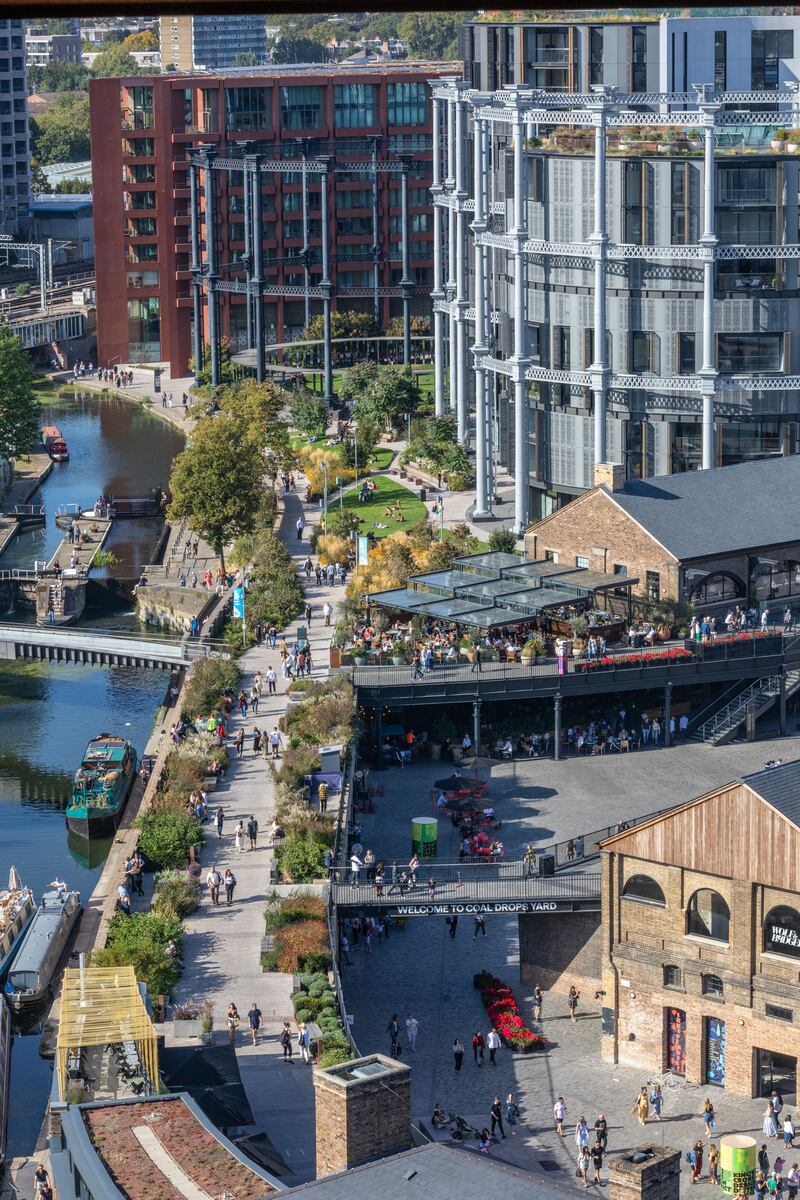 People enjoying late summer sun on Bagley Walk in King’s Cross