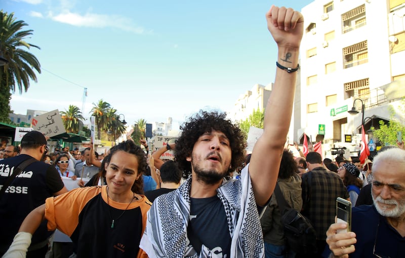 Tunisians take part in a protest against President Kais Saied in the capital last month ahead of the upcoming election (Anis Mili/AP)