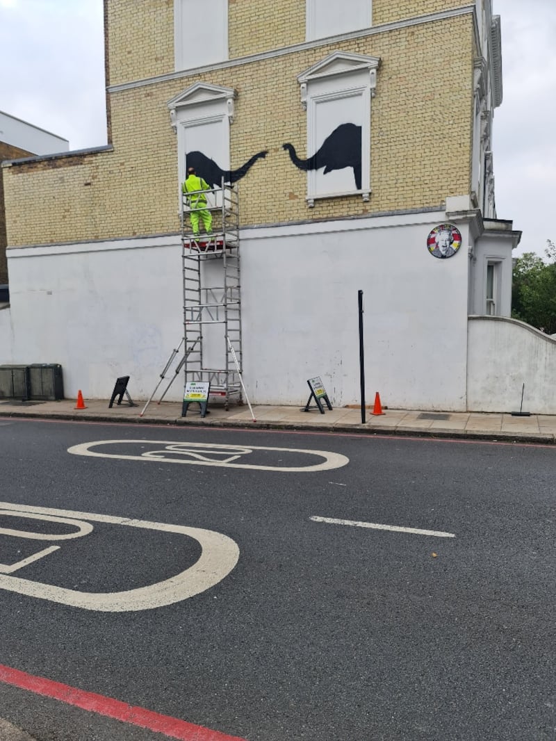 Banksy painting in Chelsea before it was restored