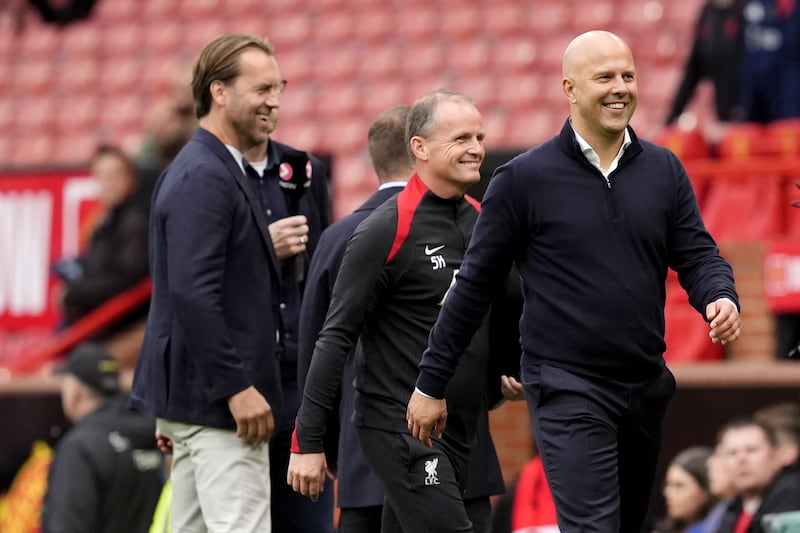 Liverpool manager Arne Slot, right, was in jovial mood after the final whistle