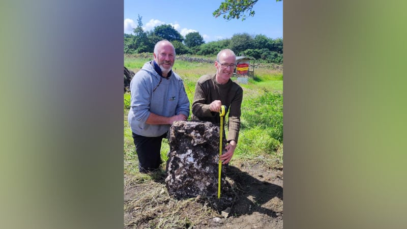 Michael Boyle and Alan Moore with the archaeological find